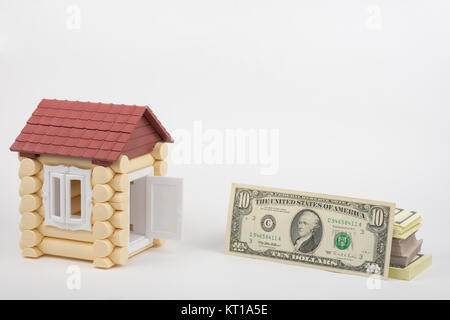 À toy house a ouvert la porte, la porte est un paquet de dollars US Banque D'Images