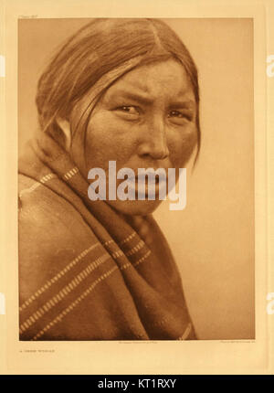 Photographie de portrait de la collection Edward S. Curtis, représentant des Amérindiens en tenue traditionnelle. Banque D'Images