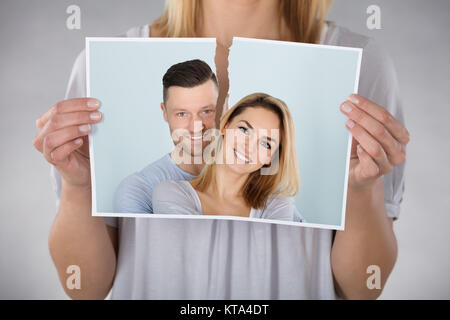 Femme Photo déchire Banque D'Images