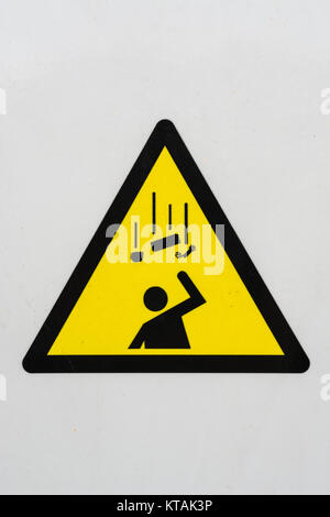 Site de construction panneau d'avertissement pictogrammes illustrant la chute d'objets "danger". Banque D'Images