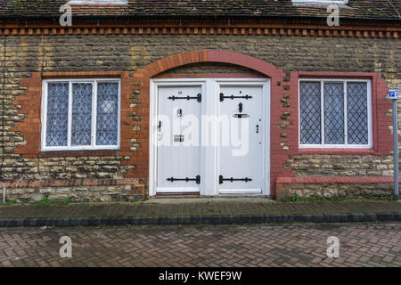 Façade d'une partie d'une terrasse de maisons de ville classée Grade II, Stony Stratford, España Banque D'Images