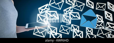 Image composite de la section moyenne d'une femme d'affaires avec une tablette numérique Banque D'Images