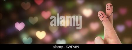 Les doigts de la Saint-Valentin aiment couple et bokeh coeur lumières briller Banque D'Images