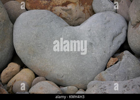 Pierre en forme de coeur, mer, Malcolm Buckland Banque D'Images