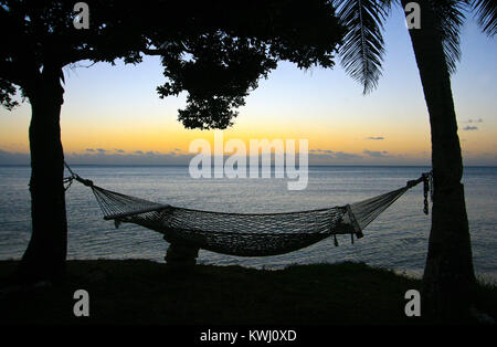 L'hamac. L'île de Lifuka. Les îles Ha'apai. Tonga. Polynésie française Banque D'Images