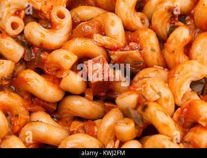 Close Up de jambon pâtes en sauce tomate Banque D'Images