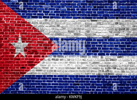 Drapeau de Cuba a peint sur mur de brique, la texture d'arrière-plan Banque D'Images