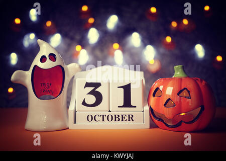 Date calendrier Halloween le 31 octobre à la citrouille et ghost Banque D'Images