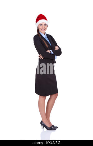 Smiling businesswoman with Santa hat, confiant employeur, isolé sur fond blanc Banque D'Images