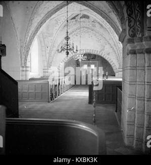 Photographie de l'église Sankt Laurentius à Skivarp, Suède, soulignant sa conception architecturale et son importance historique pour la communauté locale. Banque D'Images