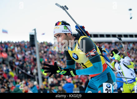 Inzell, Allemagne. 10 janvier, 2018. Le biathlète Martin Fourcade de la France quitte la plage de prise de vue au cours de l'événement unique de 20 km à la Coupe du Monde dans le Chiemgau Arena à Inzell, Allemagne, 10 janvier 2018. Credit : Matthias Balk/dpa/Alamy Live News Banque D'Images