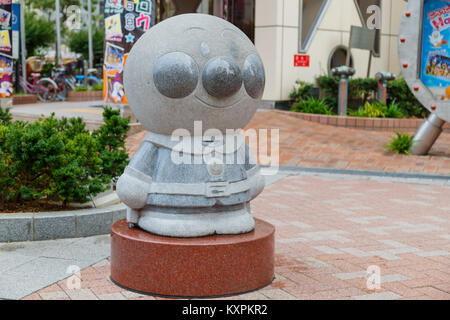 KOBE, JAPON - le 26 octobre : Caractère Anpanman à Kobe, Japon le 26 octobre 2014. Sculptures en pierre de la fameuse "dessins animés japonais' Anpanman à proximité e Banque D'Images