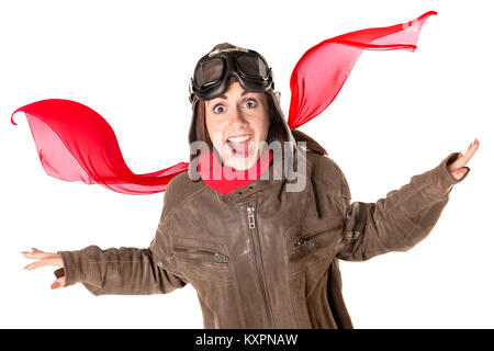 Funny Girl avec rousseur portant un casque, des lunettes et une écharpe rouge Banque D'Images