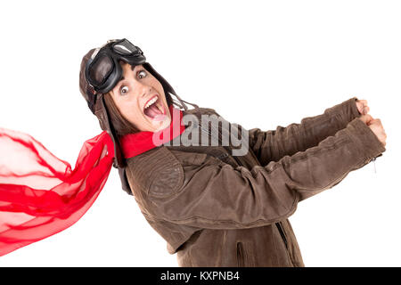 Funny Girl avec rousseur portant un casque, des lunettes et une écharpe rouge Banque D'Images