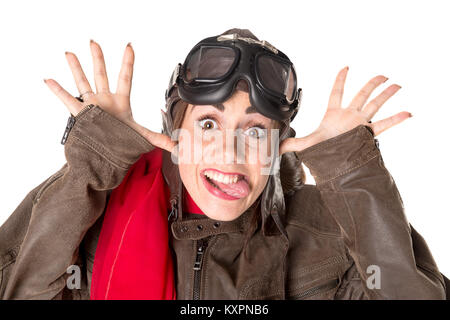 Funny Girl avec rousseur portant un casque, des lunettes et une écharpe rouge Banque D'Images