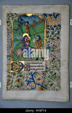 Page d'un livre d'heures du xve siècle, écrit en France sur du vélin, montrant Joseph et Marie prendre Jésus à l'Egypte. (Fragment 19) de la Collection des livres rares Reed à Dunedin, Nouvelle-Zélande. Banque D'Images