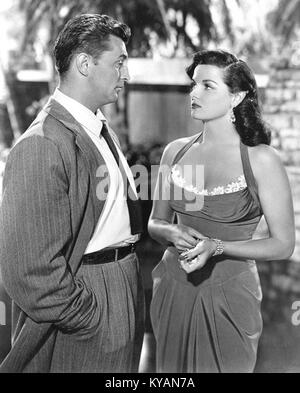 Le film de 1951 « His Kind of Woman » met en vedette Robert Mitchum et Jane Russell, illustrant les genres de films noirs et d'aventures américains du milieu du XXe siècle. Banque D'Images