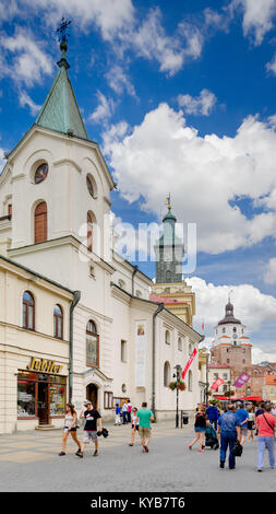 Église de l'Esprit Saint, la tour de l'hôtel de ville, porte de Cracovie, rue Krakowskie Przedmieście, Lublin, Pologne, Europe Banque D'Images