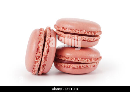 Trois macarons rose isolé sur fond blanc Banque D'Images