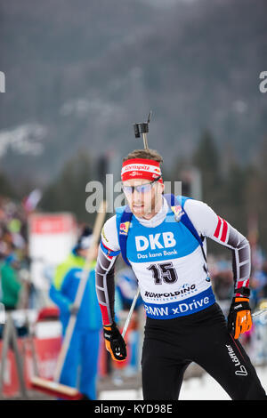 Inzell, Allemagne. 14Th Jan, 2018. Simon Eder d'Autriche (15) vu au cours de la Men's 15km départ groupé à la concurrence de la Coupe du monde de Biathlon IBU BMW à Ruhpolding. (Photo crédit : Gonzales Photo/Alamy Live News Banque D'Images