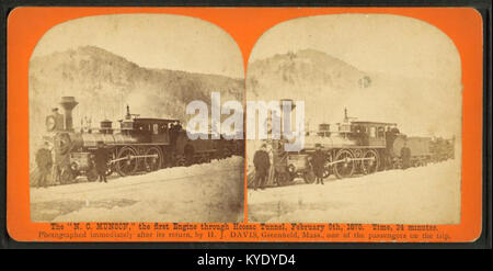 Photographie de H. J. Davis montrant la locomotive 'N.C. Munson', le premier moteur à traverser le tunnel de Hoosac dans le Massachusetts le 9 février 1875, marquant une étape importante dans l'histoire du chemin de fer américain. Banque D'Images
