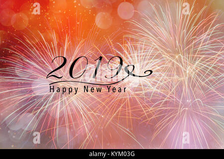 Pinked artifice contre une toile orange avec effet bokeh et chute de neige. Bonne Année 2019 citation. Banque D'Images