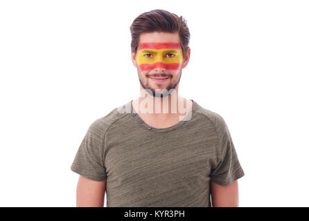 Portrait of cheerful man avec drapeau espagnol sur le visage Banque D'Images