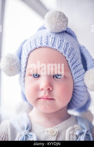 Cutie avec un joli les cheveux blonds et les yeux bleus d'un Banque D'Images
