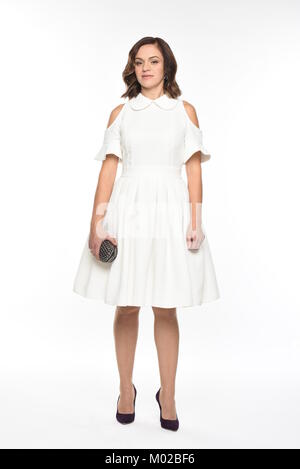 Pretty brown-haired woman posing in divers vêtements Banque D'Images