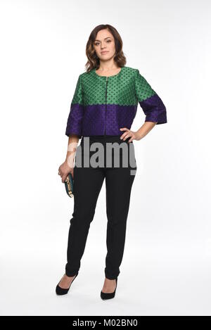 Pretty brown-haired woman posing in divers vêtements Banque D'Images