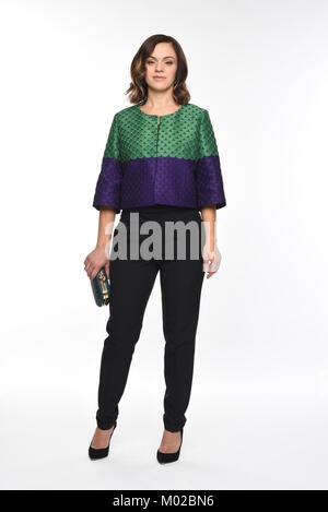Pretty brown-haired woman posing in divers vêtements Banque D'Images