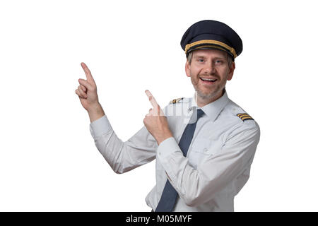 Projet pilote en uniforme avec rayures dorées points avec ses doigts dans l'air Banque D'Images