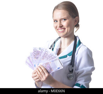 Doctor holding money bills Banque D'Images