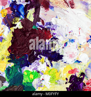 Palette lumineuse de l'artiste, la texture d'un mélange de différentes couleurs de peinture à l'huile, mélanger taches, taches, la texture pour un arrière-plan créatif moderne Banque D'Images