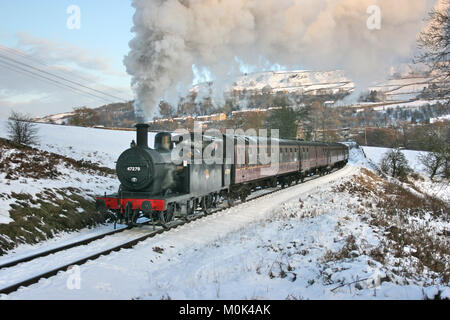 Jinty sur une locomotive à vapeur à la Spéciale Santa Concon et vaut Valley Railway, Oakworth, West Yorkshire, UK - Janvier 2010 Banque D'Images