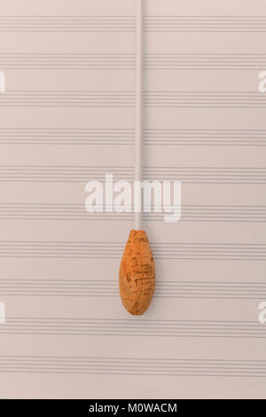 Baton sur une feuille de papier Banque D'Images