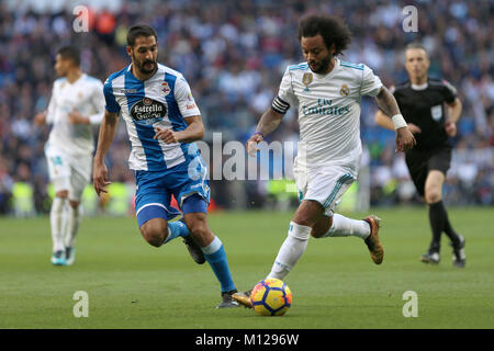 MADRID, ESPAGNE. 21 janvier 2018 - Marcelo avec la balle avec Celso Borges plus près de lui. Chambres doubles pour Cristiano Ronaldo, balle et Nacho, aux côtés Modr Banque D'Images