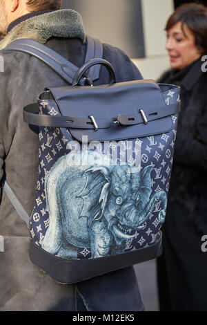 MILAN - JANUARY 14: Man with Alpha Industries blue bomber jacket and red Louis  Vuitton Supreme pouch before MSGM fashion show, Milan Fashion Week stre  Stock Photo - Alamy