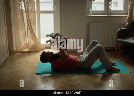 Père et fils jouent ensemble Banque D'Images
