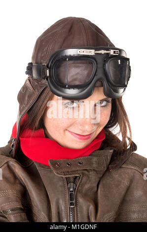 Funny Girl avec rousseur portant un casque, des lunettes et une écharpe rouge Banque D'Images