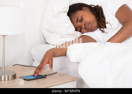 Close-up of an African Girl Sleeping On Bed Banque D'Images