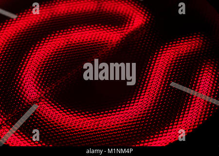 Le red-hot red-brûleur plaque à induction close up. Banque D'Images