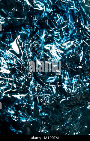 Brillant plastique Voir l'intermédiaire Résumé Shimmer Bleu Fond plié Banque D'Images