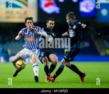 San Sebastian, Espagne. 09Th Feb 2018. (19) Alvaro Odriozola Arzallus, (16) Luis Carlos Correia Pinto, (15) Adrian Lopez Alvarez au cours de l'espagnol La Liga match de foot entre Real Sociedad Deportivo de La Coruna et, au stade Anoeta, à San Sebastian, le nord de l'Espagne, Vendredi, Février. 2, 2018. Más Información Gtres Crédit : Comuniación sur ligne, S.L./Alamy Live News Banque D'Images