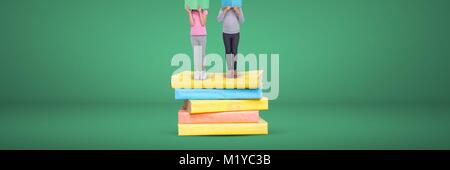 Deux jeunes filles la lecture et l'article sur une pile de livres avec un fond vert Banque D'Images