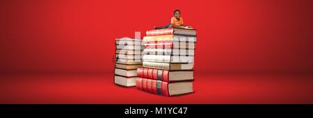 Boy reading sur une pile de livres sur fond rouge Banque D'Images