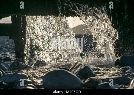 Canalisation d'écoulement d'eau sur la plage de Prestatyn North Wales Banque D'Images