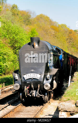 Classe A4 Pas du Pacifique 60007 «Sir Nigel Gresley' arrivant à Goathland avec l 1030 Grosmont - Pickering, et transportant le Flying Scotsman de lit. Banque D'Images