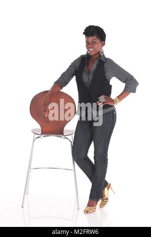 Femme africaine en uniforme occasionnels qui pose à côté d'un président Banque D'Images