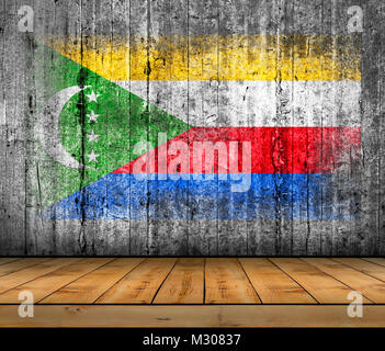 Drapeau Comores peint sur la texture de fond en béton gris avec plancher en bois Banque D'Images